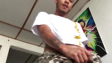 Tattooed Latino amateur Juan jerks off his big dick and cums
