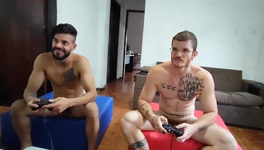 Carmona and Hisak playing video games for the money